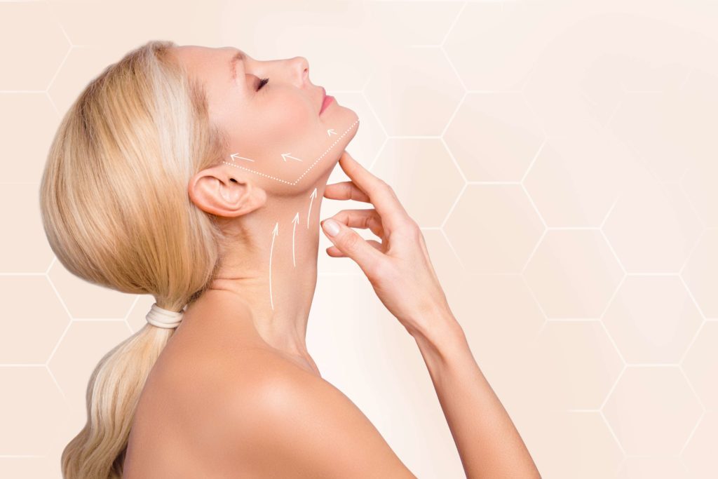 Side View of Woman with Perfect Neck Arrows Showing Lifting Direction | Skynn MD in Holly Springs, NC