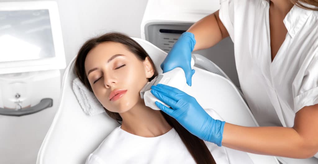 A woman getting laser hair removal treatment | Skynn MD in Holly Springs, NC