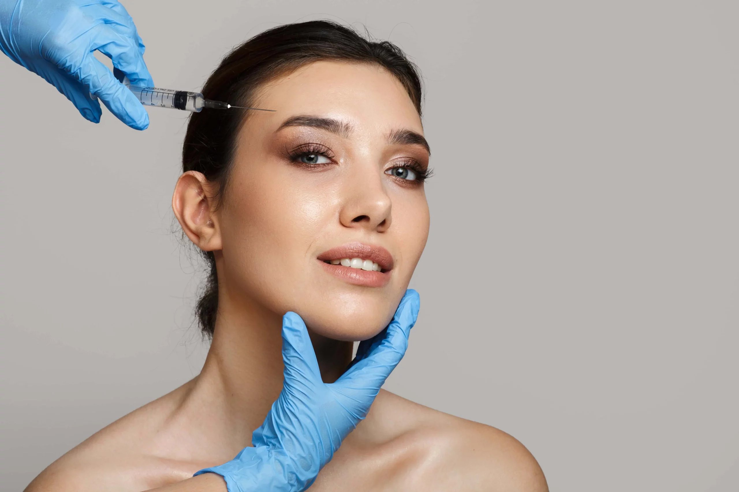 a woman getting Botox injection in Holly Springs, NC
