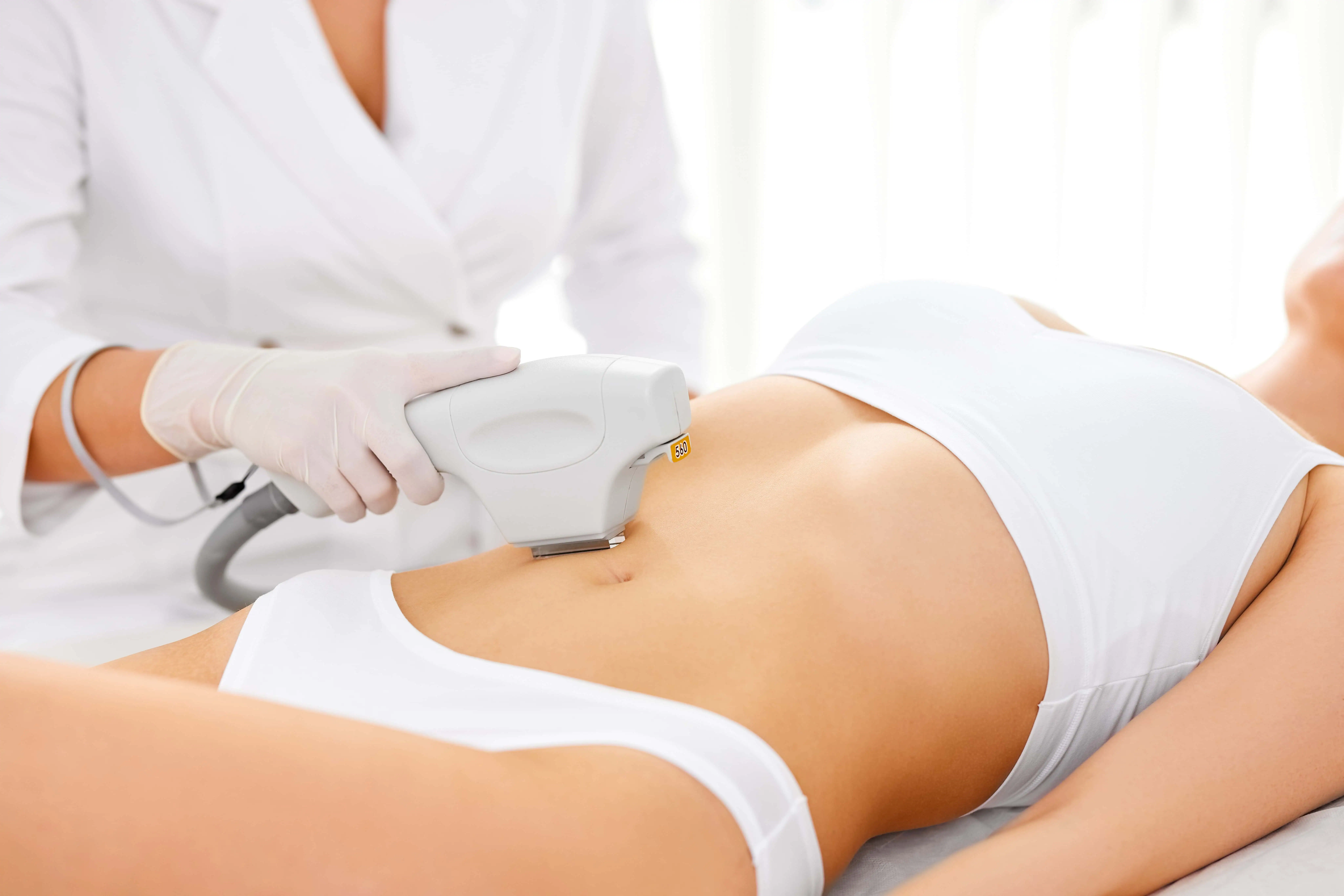 a woman receiving a laser epilation procedure, Brazilian Bikini Laser Hair Removal in Holly Springs, NC