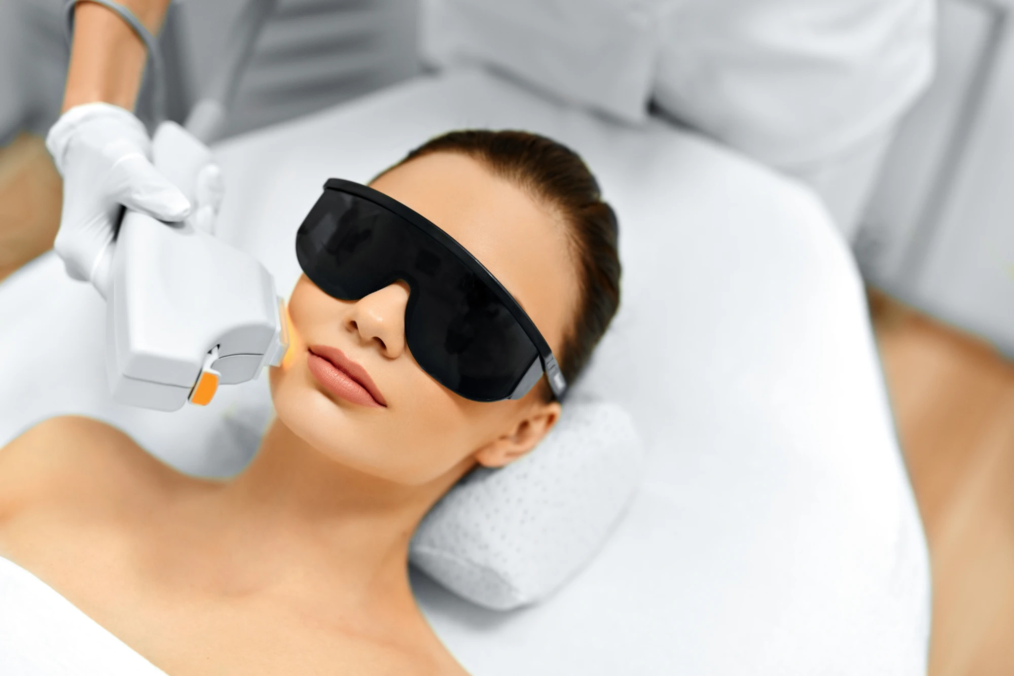 a woman getting laser treatment, Laser Hair Removal for Facial Hair in Holly Springs, NC